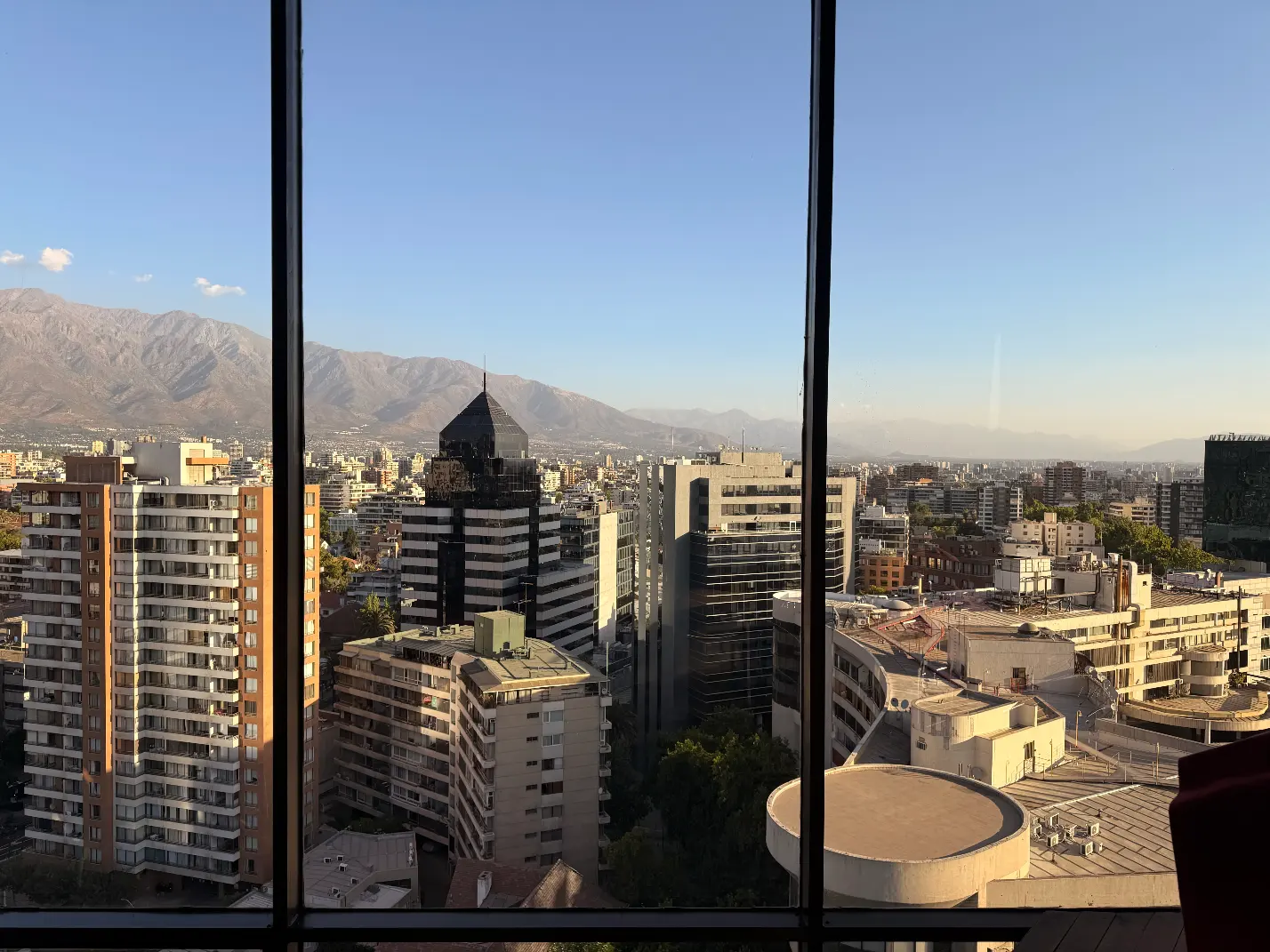 Santiago de Chile skyline at dusk with the Andes in the background